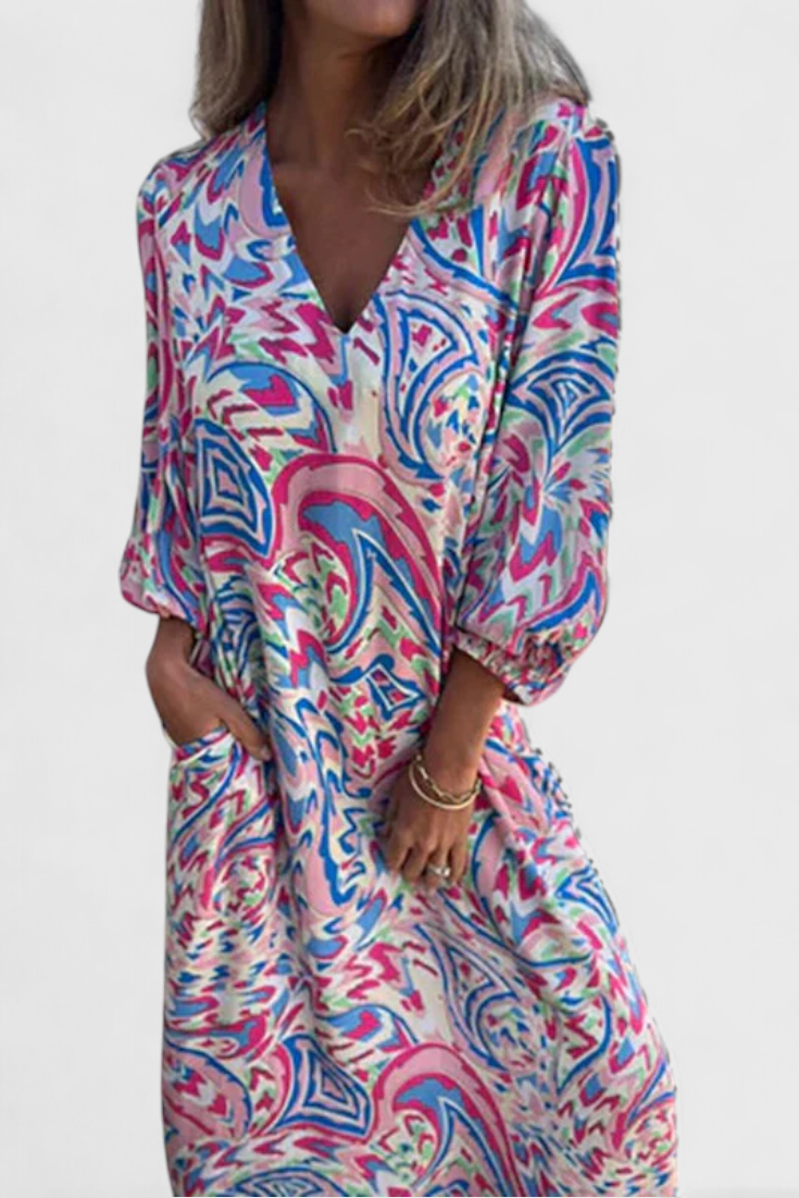 Vestido Maxi Bohemio Carmina con Escote en V y Estampado Abstracto