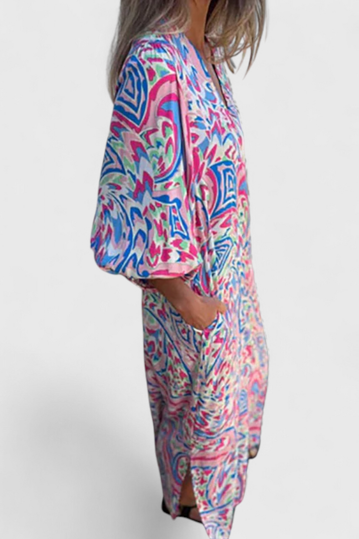 Vestido Maxi Bohemio Carmina con Escote en V y Estampado Abstracto