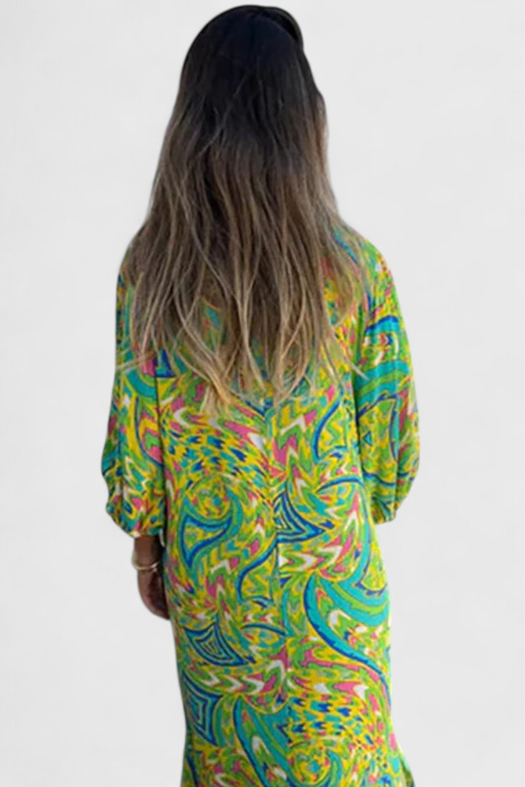 Vestido Maxi Bohemio Carmina con Escote en V y Estampado Abstracto